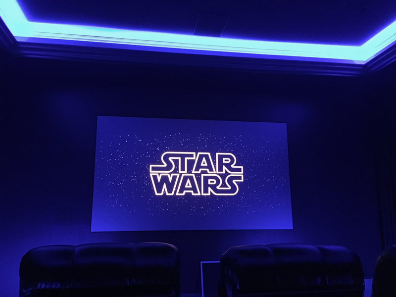 View of projector with Star Wars on the screen